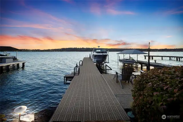 81-foot dock with 18,000 Sunstream solar boat lift, shore power, seating area & 2 swim platforms