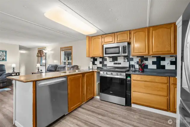 Lots of space in the kitchen to entertain and visit at the same time.