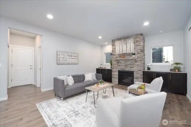 Powder room, coat closet and garage through the pictured doorway