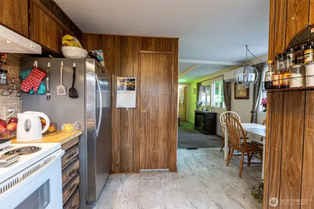 Kitchen looking towards dining room and hallway to bedrooms