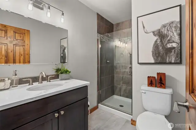 2nd bedroom ensuite bath, with access from the hall as well for ultimate functionality.