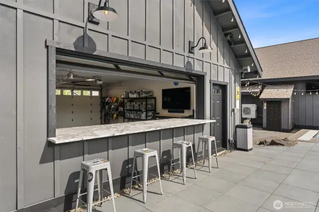 Garage "bar" with retractable door.