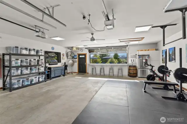 Oversize garage with room for all your toys AND a home gym.