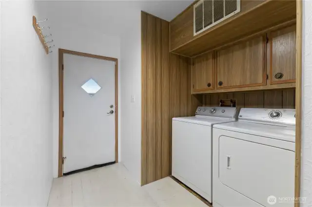 Washer-Dryer to stay. Access to the carport.