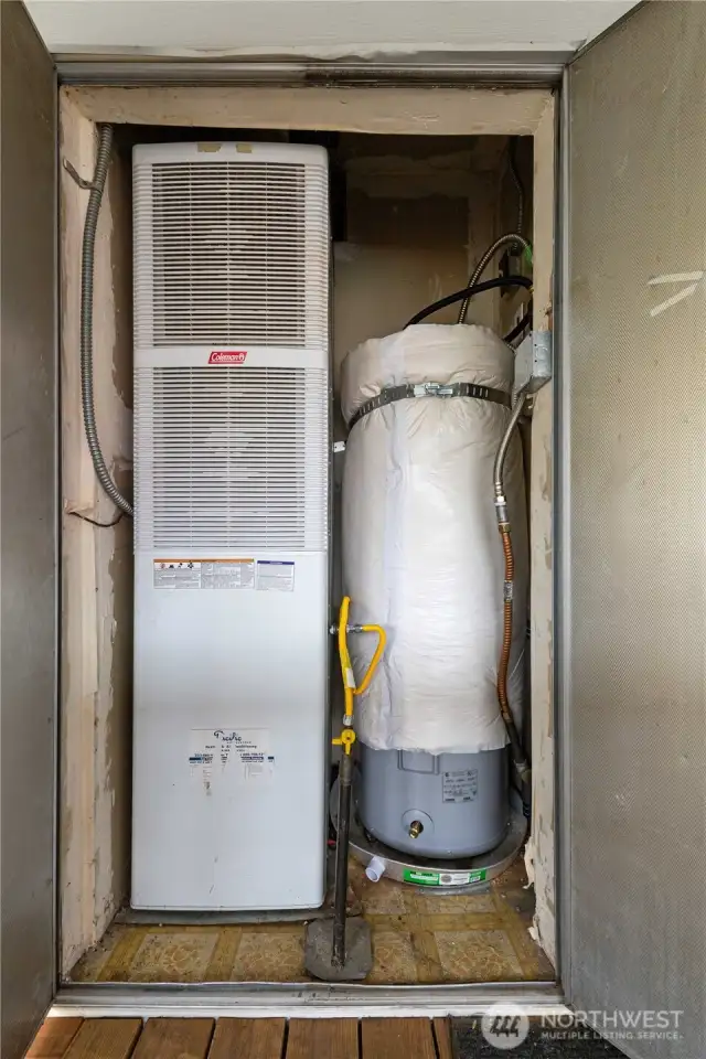 natural gas furnace & h20 located in exterior closet.