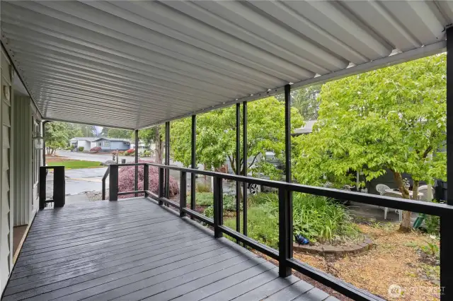 Massive covered deck at your entry way.