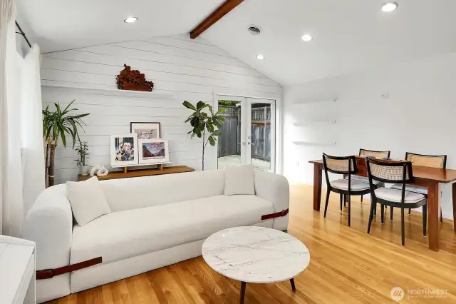 This family room has so many amazing features, including vaulted ceilings and French doors.