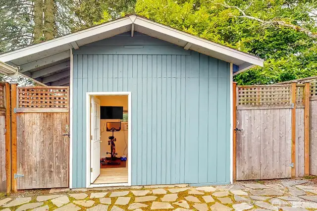 A newly built fully equipped home gym in the backyard.
