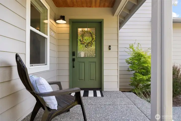 There is a welcoming aggregate front porch and walkway...let's take a look inside!