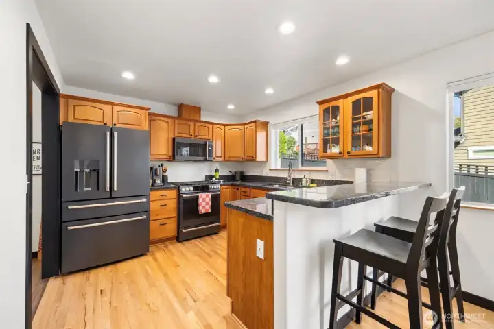 Looking across the kitchen with the raised eating bar.