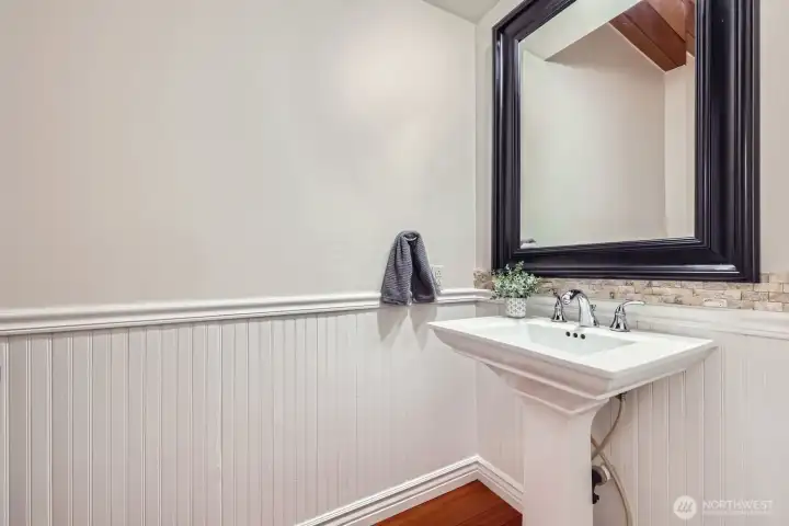Half bathroom located off the kitchen