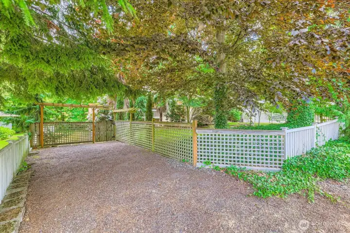 The second driveway offers private parking for the lower level ADU or RV parking