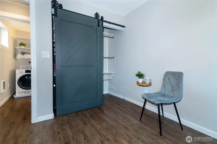 Primary Bedroom, built-in's in the closed as well as hot water heater in closet