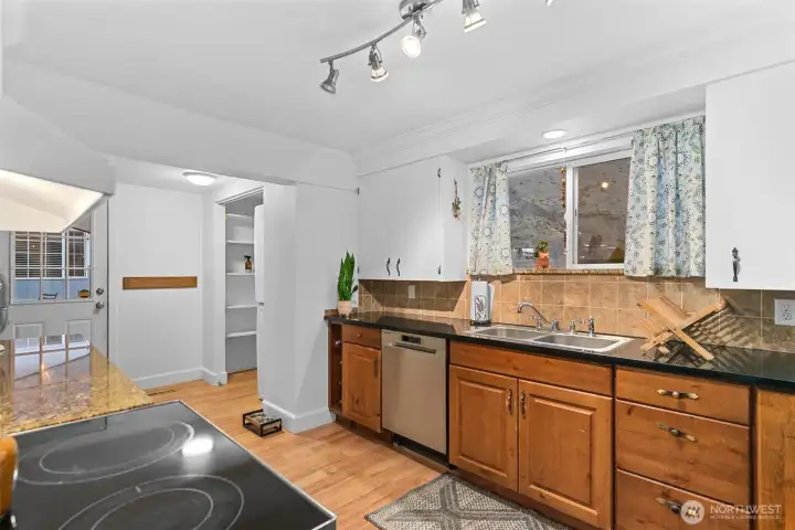 Laundry area to left of side entry before kitchen