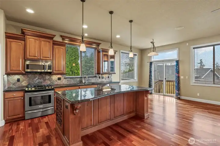 Beautiful kitchen with granite countertops, stainless steel appliances