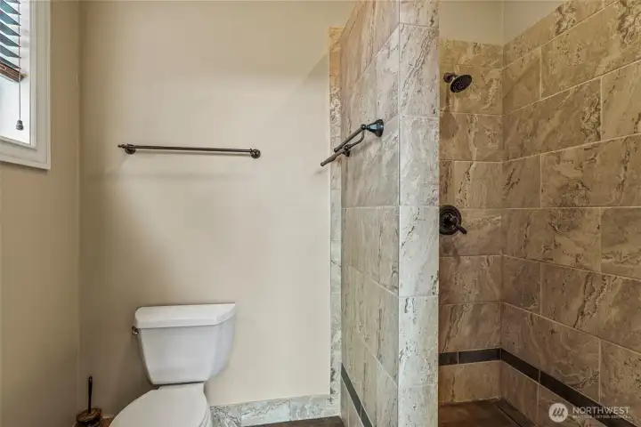 Primary bath with roll in shower