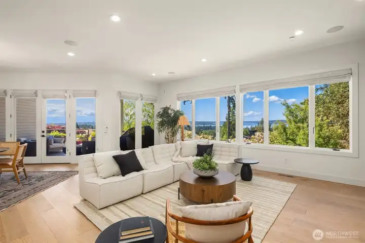 The inviting family room is ideal for relaxing while soaking in the spectacular views.