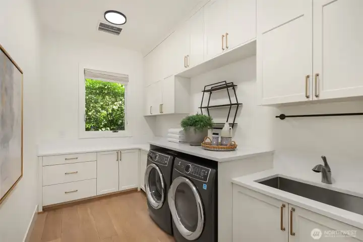 Upstairs laundry room.
