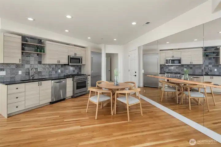 The highlight: a full generational living suite featuring its own kitchen, private single-car garage, bedroom, and bath-perfect for guests or extended family.