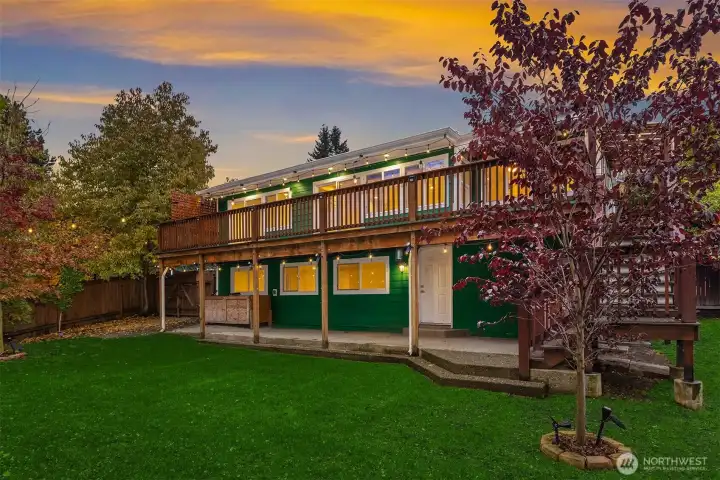 Level rear yard with plenty of patio, lawn & garden space - a beautiful, private retreat!