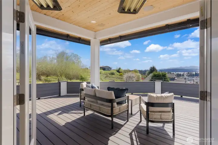Covered Deck Area with Infrared Heaters, and Retractable Awnings
