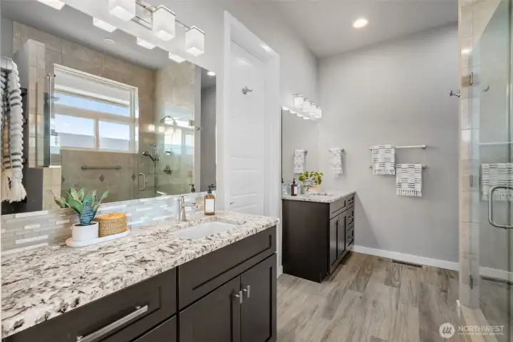 Double Vanities in the Ensuite Bathroom - Door to Walk-in Closet