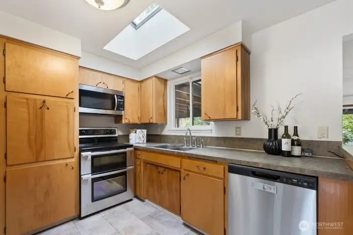 Large kitchen with stainless appliances and plenty of counter space