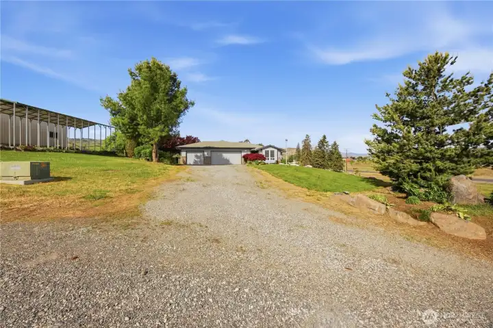Tons of Parking with RV Storage & Shop as well as 3 car garage