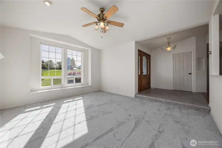 Sunken living room with cozy propane fireplace—perfect for relaxing and gathering