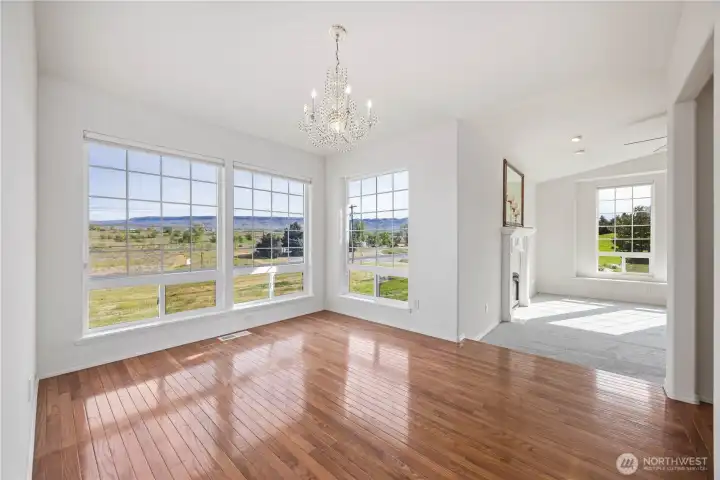 Formal dining room with hardwood floors