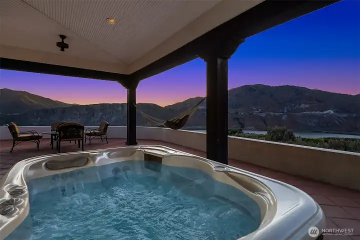 Enjoy sunsets from hot tub or hammock