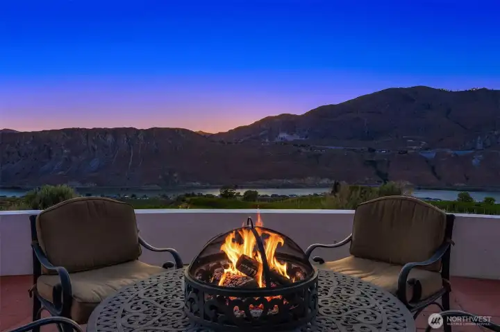 Fireside chats as the sun sets over the Columbia Rover