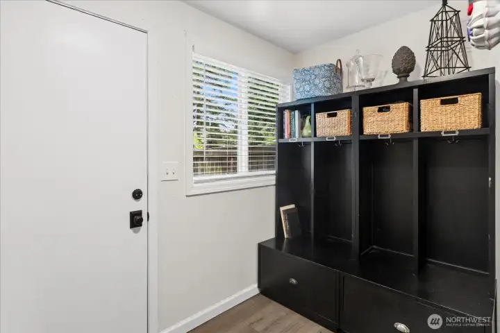 Additional outside door to the back yard, great for letting the pets out or grilling.