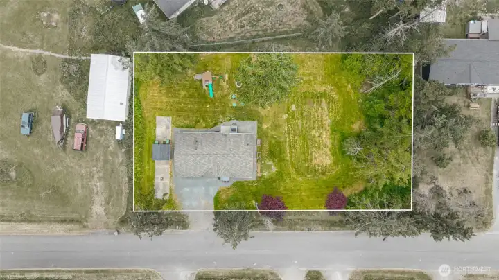 Just under a half acre, there is plenty of room for space and activities.