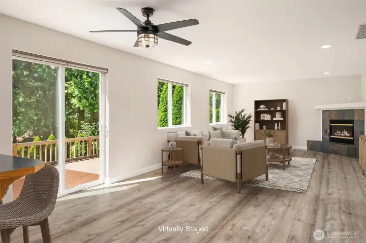 Kitchen Open to Family Room - LVP Flooring - Gas Fireplace