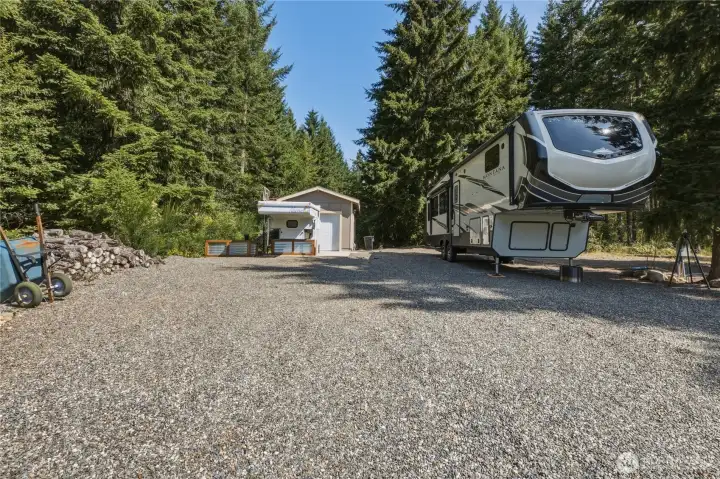 RV space with full hookup 50 amp power and septic drain.