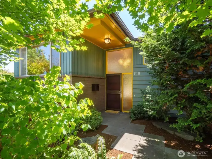 The greenery is just getting started as you enter the front yard into the house. The greenery is just getting started as you enter the front yard into the house.