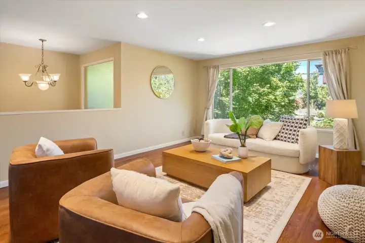 Welcome friends, family, or peaceful solitude in the bright and spacious living room. Welcome friends, family, or peaceful solitude in the bright and spacious living room.