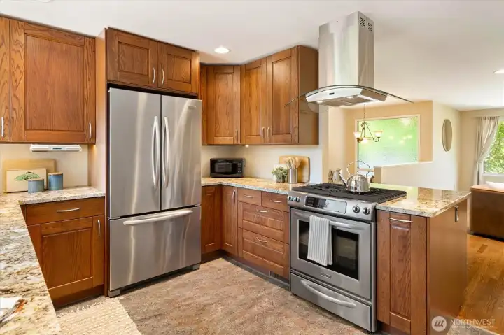The updated kitchen and open layout make cooking a dream. The updated kitchen and open layout make cooking a dream.
