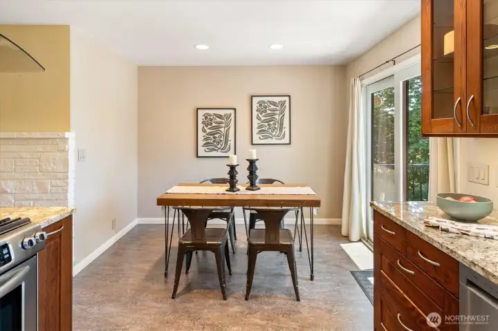 An informal dining room adjoins the large and well thought out kitchen. An informal dining room adjoins the large and well thought out kitchen.