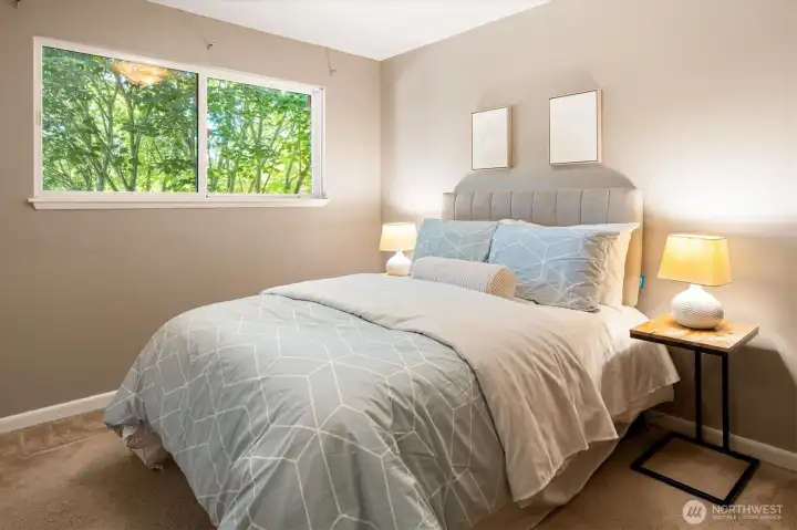 The third main floor bedroom also offers hardwoods under the carpet. The third main floor bedroom also offers hardwoods under the carpet.