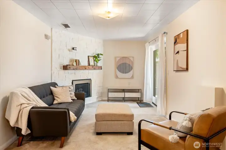 Large and activity-ready, the downstairs rec room is the perfect place for activities of all kinds. The gas fireplace, whole house A/C and patio access make it ready for any season. Large and activity-ready, the downstairs rec room is the perfect place for activities of all kinds. The gas fireplace, whole house A/C and patio access make it ready for any season.