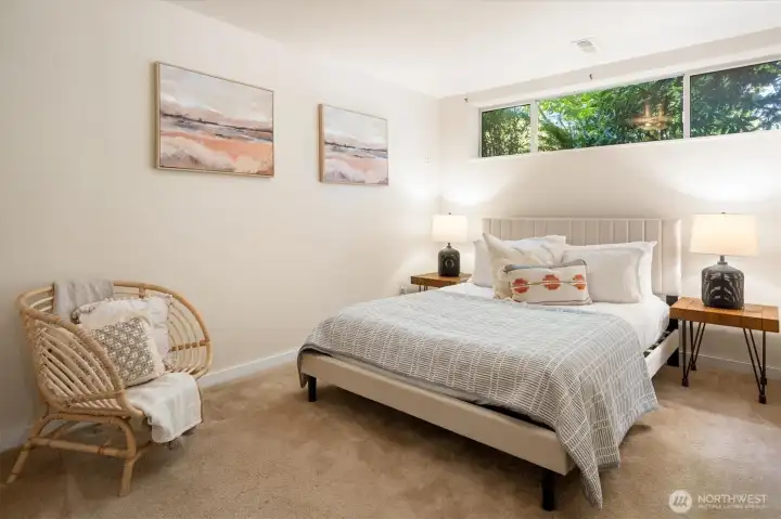 The lower level bedroom is large and features nice light. The lower level bedroom is large and features nice light.