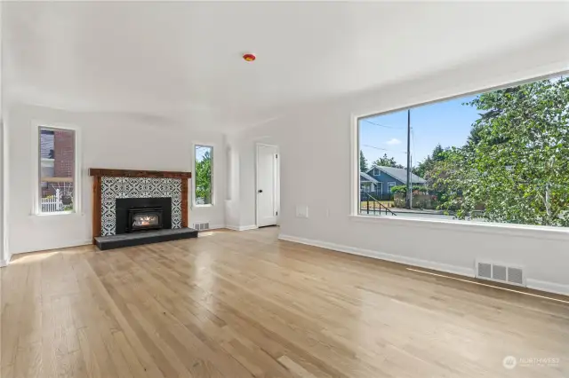 Gorgeous huge windows and a newly finished fireplace