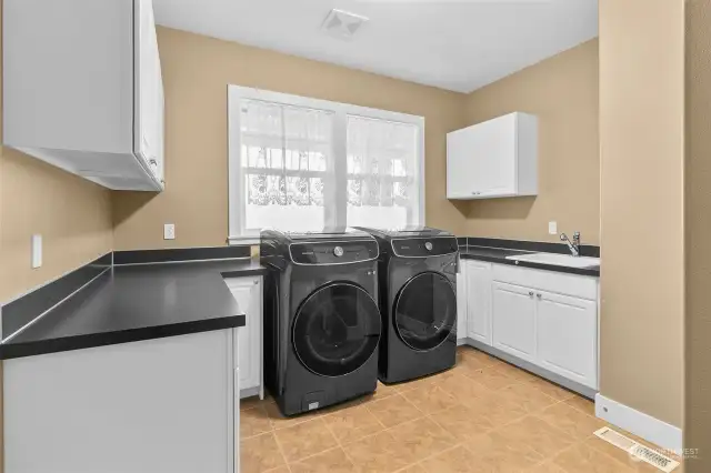 Generous Utility Room with plenty of Storage Space