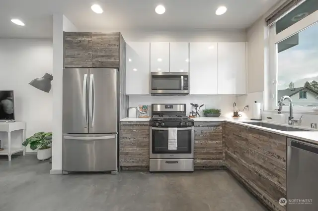 Modern kitchen equipped with a gas range.