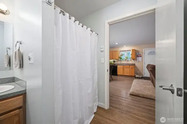 Main bathroom with laundry