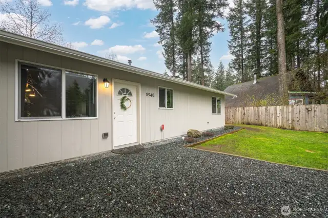 Clean and easy landscaping at front of house