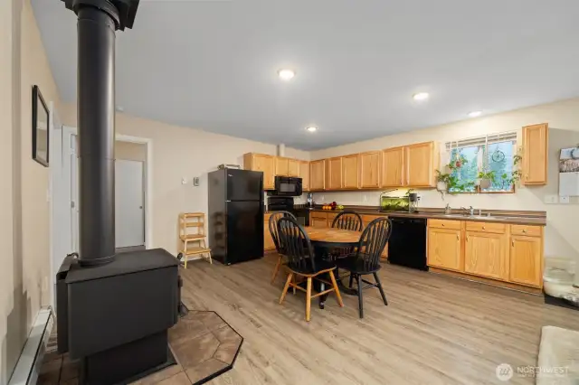 Wood Stove, dining and kitchen areas
