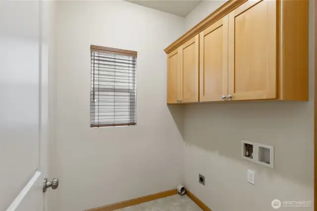 Laundry room just inside of garage.